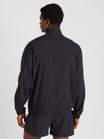 Reebok - Sweatshirt de desporto 'TRAIN MOTION' em preto