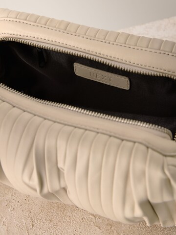 Next Olkalaukku värissä beige