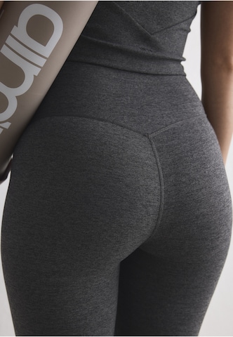 Aim'n - Flared Calças de desporto 'Sense' em cinzento