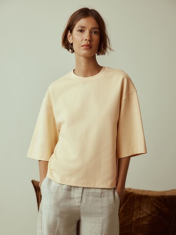 Next Póló - sárga: elől