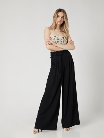 Guido Maria Kretschmer Women Loose fit Pleat-front trousers 'Fee' in Black