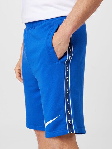 Regular Pantaloni de la Nike Sportswear pe albastru