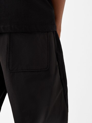 Bershka Zúžený Kalhoty – černá