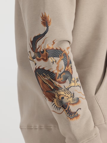 ALPHA INDUSTRIES Sweatshirt 'Dragon' in Bruin