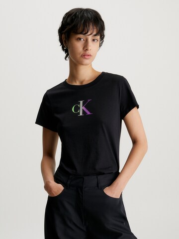 T-shirt Calvin Klein Jeans en noir : devant