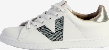 Chaussure de sport à lacets victoria en gris : devant