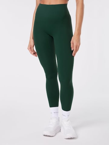 YO-GAYA Skinny Leggings in Green: front