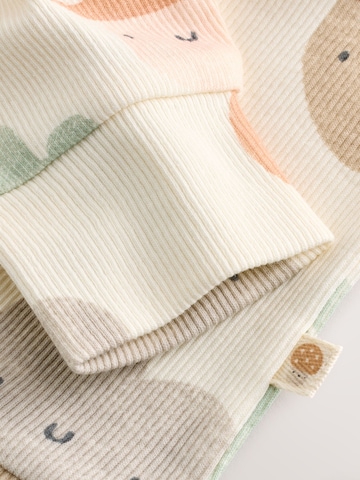 Set Next en beige