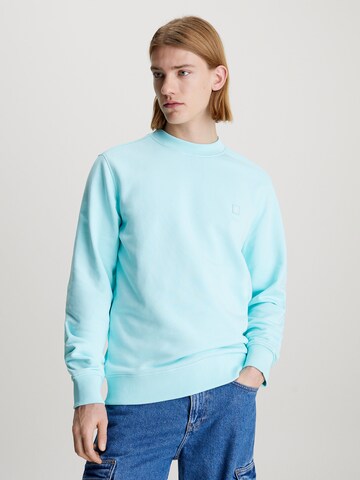 Sweat-shirt Calvin Klein Jeans en bleu : devant