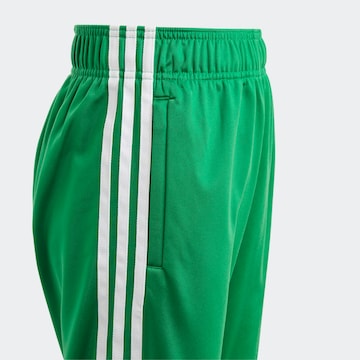ADIDAS ORIGINALS Tapered Pants 'Adicolor Sst' in Green