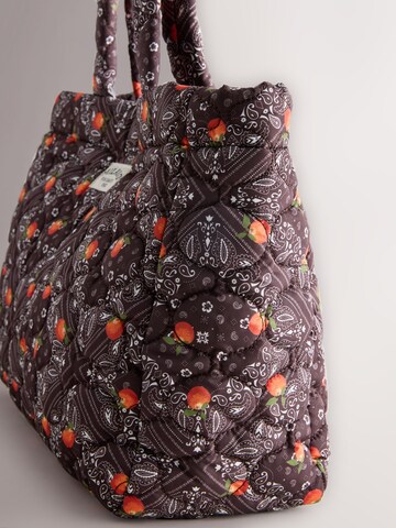 Next Shopper in Bruin