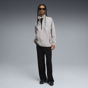 PUMA Sportsweatshirt 'Pumatech' in Grijs