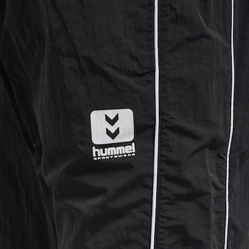 Effilé Pantalon de sport 'Walter' Hummel en noir