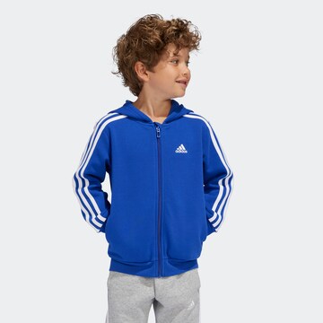 Veste de survêtement ADIDAS SPORTSWEAR en bleu : devant