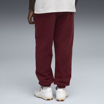 PUMA Regular Sports trousers 'Essentials' in Red