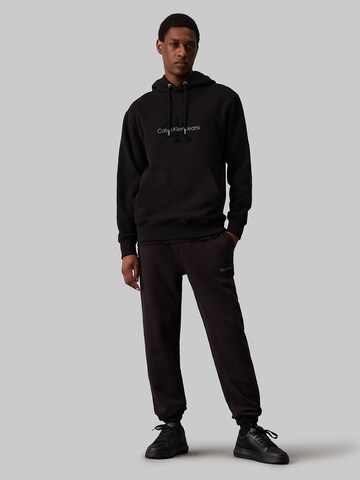 Effilé Pantalon Calvin Klein Jeans en noir