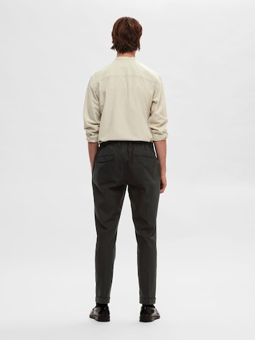 Regular Pantalon à plis SELECTED HOMME en noir