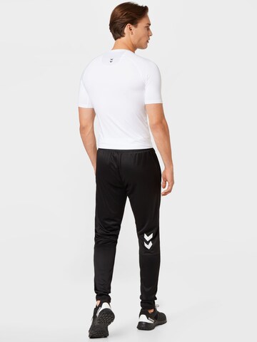 Regular Pantaloni sport de la Hummel pe negru