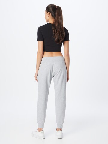 Effilé Pantalon de sport DKNY Performance en gris