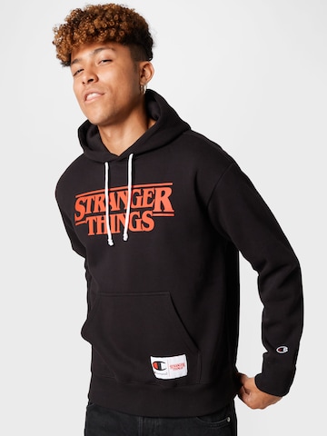 Champion Authentic Athletic Apparel Sweatshirt in Black: front