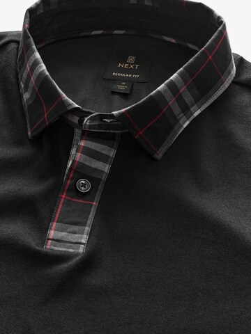 Next Poloshirt in Schwarz