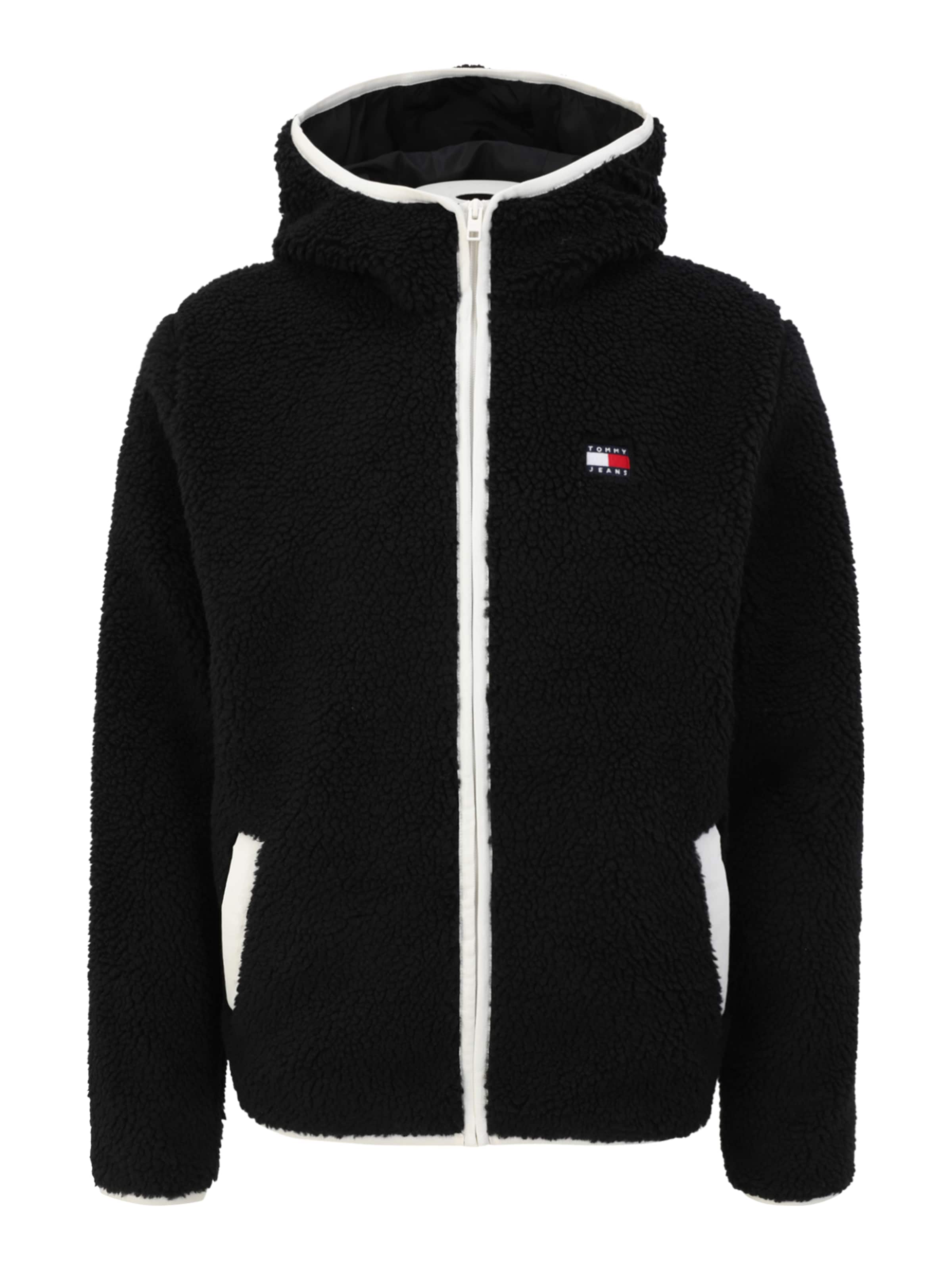 Jachetă  fleece de la Tommy Jeans pe negru: față