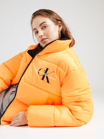 Calvin Klein Jeans Зимняя куртка '90S' в Оранжевый