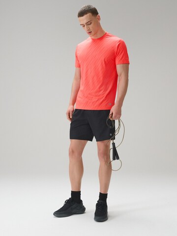 Next Λειτουργικό μπλουζάκι 'Active' σε πορτοκαλί