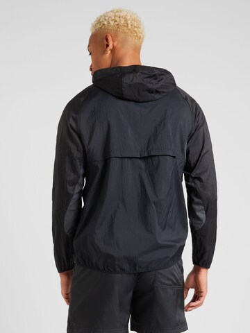 NIKE Trainingsjack 'TRAIL AIREEZ' in Zwart