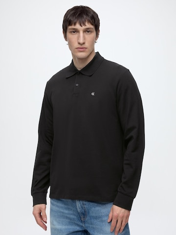 Calvin Klein Jeans T-shirt i svart: framsida