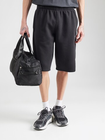 ADIDAS ORIGINALS Regular Trousers 'ESS' in Black: front
