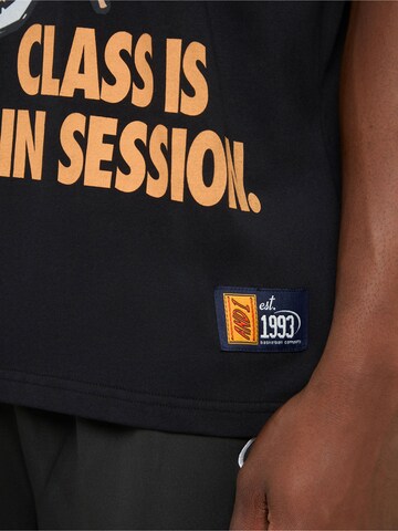 AND1 T-shirt 'Der Unterricht hat begonnent' i svart