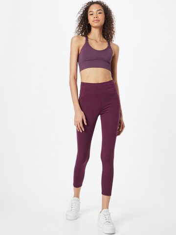 Skinny Pantaloni sport de la Girlfriend Collective pe roșu