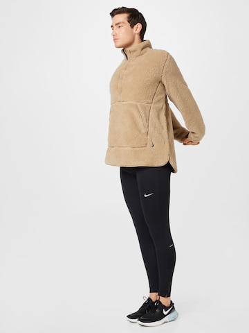 NIKE Skinny Urheiluhousut 'Phenom' värissä musta