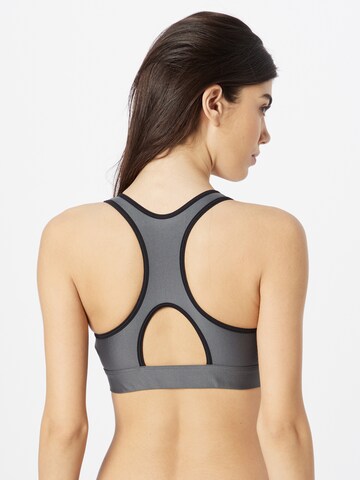 UNDER ARMOUR - Soutien Bustier Soutien de desporto 'Authentics' em cinzento