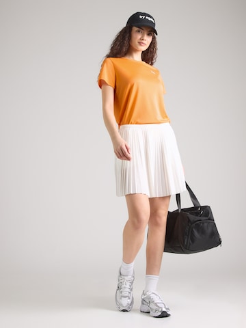 UNDER ARMOUR Koszulka funkcyjna w kolorze pomarańczowy