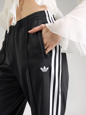 ADIDAS ORIGINALS Na zvonec Hlače 'Firebird' | črna barva