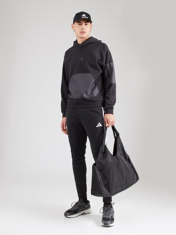 ADIDAS SPORTSWEAR - Sweatshirt de desporto 'City Escape' em preto