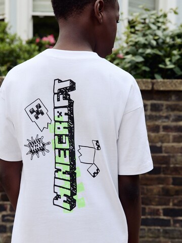 T-Shirt Next en blanc