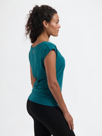 Urban Goddess Yoga & Activewear Sporttop 'Asana Yoga and Pilates' in Grün