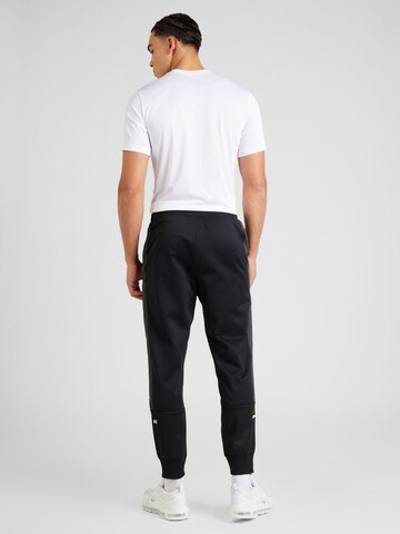 Nike Sportswear Tapered Housut 'AIR' värissä musta