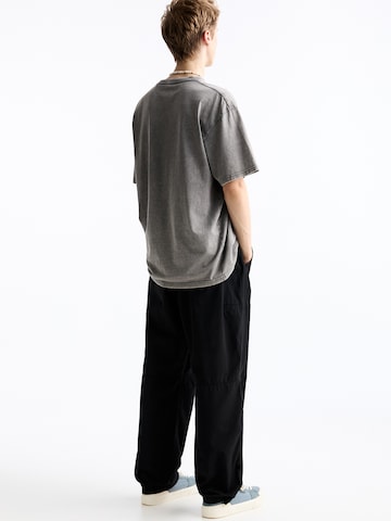 Pull&Bear Ohlapna forma Hlače | črna barva