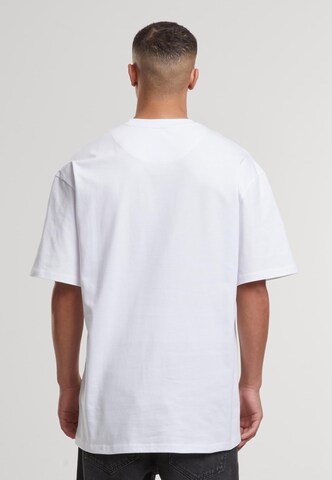 Karl Kani T-Shirt 'Small Signature Essential' in Grün