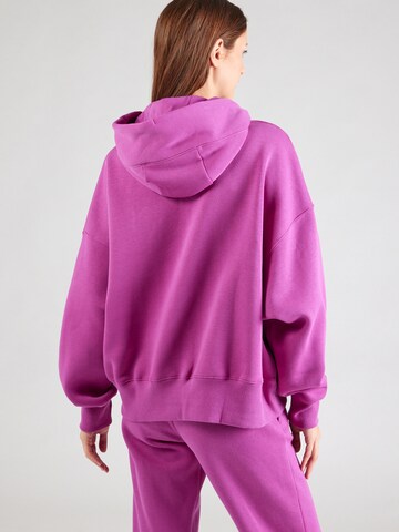 Nike Sportswear Bluzka sportowa 'Phoenix Fleece' w kolorze różowy