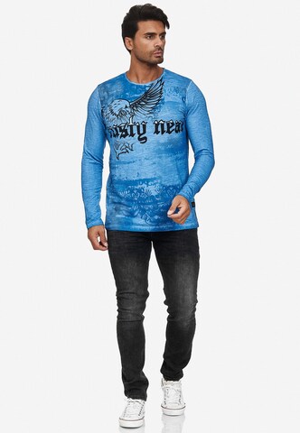 Rusty Neal Langarmshirt mit coolem Front- Print in Blau