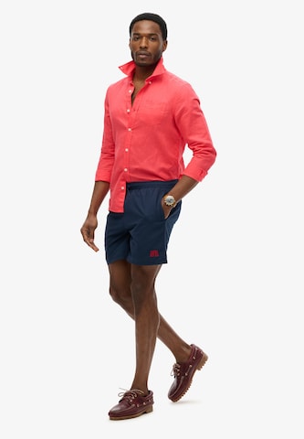 Shorts de bain 'Essential' Superdry en bleu