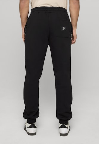 Unfair Athletics Tapered Outdoorbroek 'TTW' in Zwart