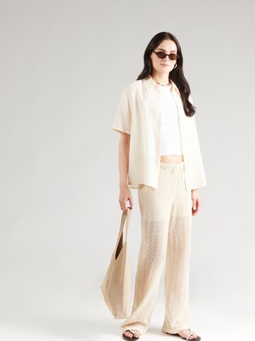 Loosefit Pantalon 'Lotti' ABOUT YOU en beige