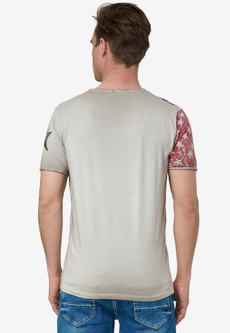 Rusty Neal Cooles T-Shirt mit V-Ausschnitt in Beige