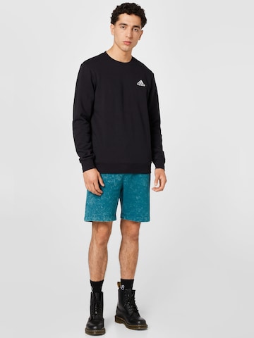 ADIDAS SPORTSWEAR - Sweatshirt de desporto 'Essentials' em preto